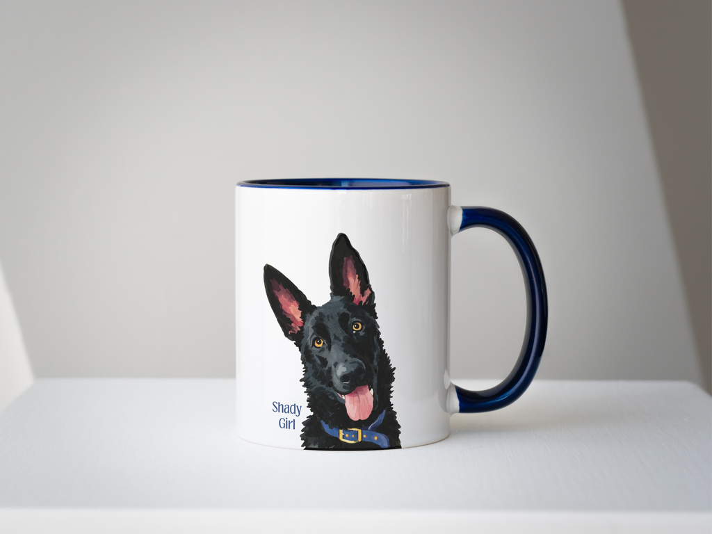 Mug with a dog illustration and a circular photo of a real dog, on a white surface.