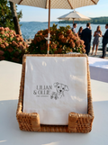 cocktail napkins with dog art and custom text and cocktail at a wedding