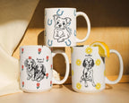 Three mugs with custom dog illustrations and names, cowboy dog mug with horseshoes, mug with two dogs and tulips, mug with sunflowers and dog