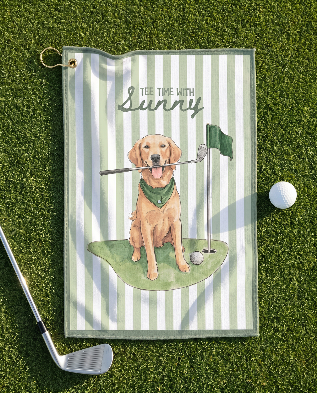 Golf towel with a dog illustration and text on a grass background
