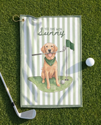 Golf towel with a dog illustration and text on a grass background