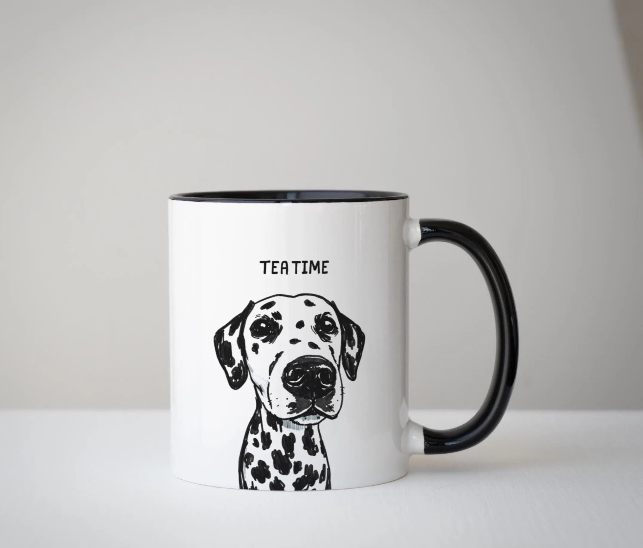 Mug with a Dalmatian illustration and 'Tea Time' text on a white background