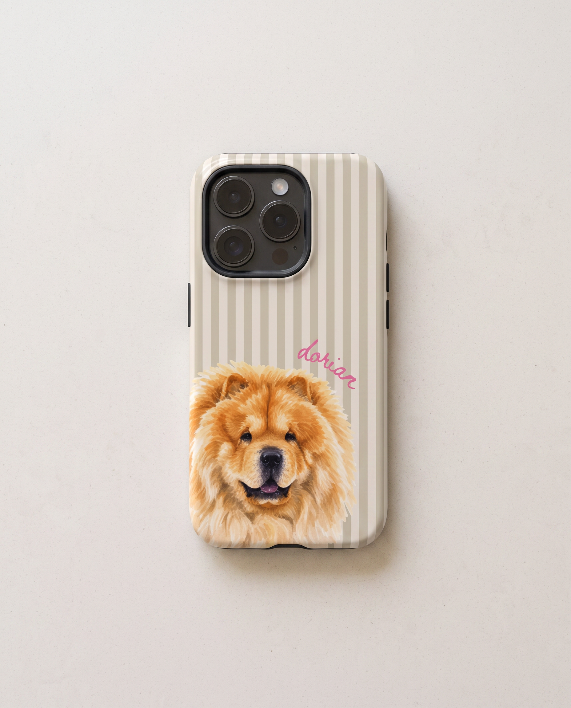 A phone case featuring a portrait of a Chow Chow dog on a cream and beige vertically striped background, with the name 'dorian' in pink script, shown on a light gray background.