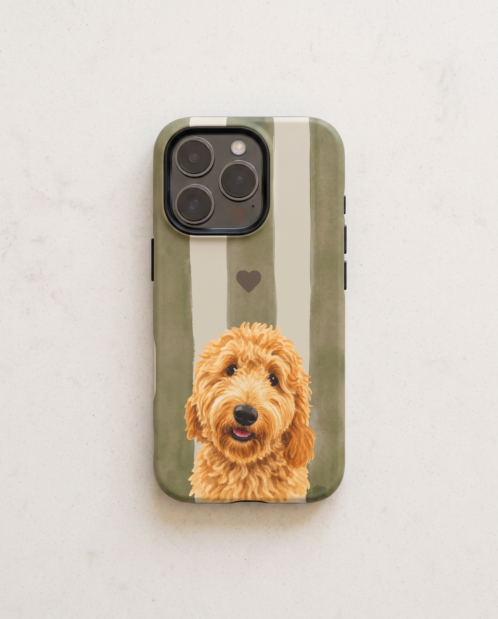 A protective phone case featuring a vertical olive green and cream stripe pattern with a small heart and a printed illustration of a golden doodoodle dog on the lower half, shown on a light gray marble background.