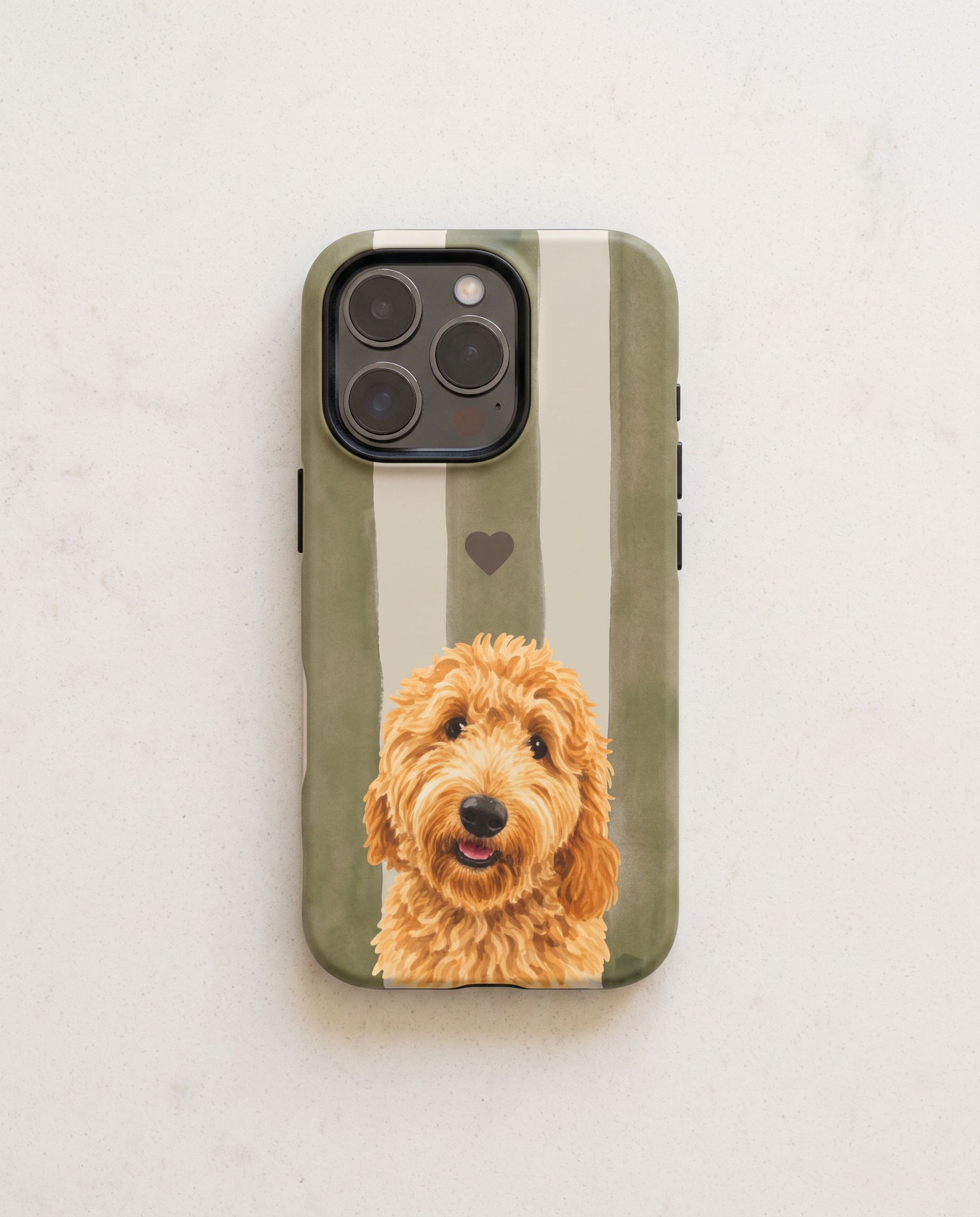 A protective phone case featuring a vertical olive green and cream stripe pattern with a small heart and a printed illustration of a golden doodoodle dog on the lower half, shown on a light gray marble background.