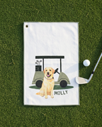 Golf towel with a yellow lab dog and golf cart illustration on a grass background
